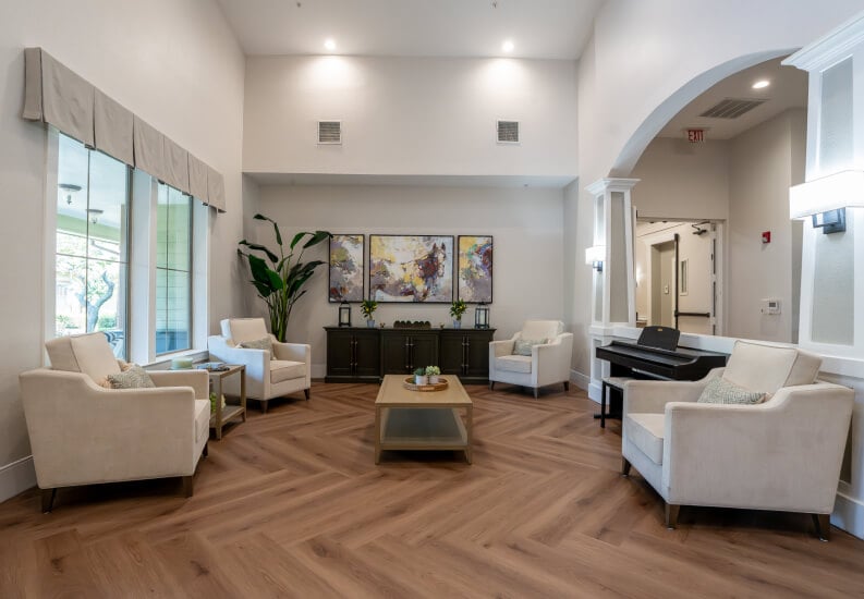 Grand Lobby Piano Lounge with High Ceilings for Seniors at Assisted Living Facility Grand Lobby Piano Lounge with High Ceilings for Seniors at Assisted Living Facility