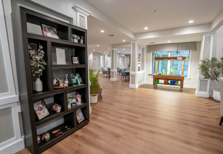 Open Lobby Hallway with Display Shelves for Seniors at Assisted Living Facility Open Lobby Hallway with Display Shelves for Seniors at Assisted Living Facility